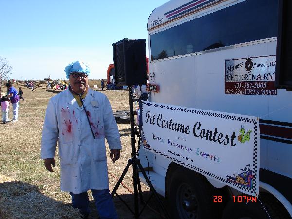 Rudy Casias as a mad doctor in front of booth set up 2006